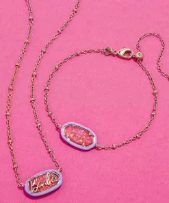 Barbie™ X Kendra Scott Gold Elisa Satellite Reversible Necklace In Pink Iridescent Glitter Glass -Earrings Bracelets Elegant Shop Kendra Scott Barbie Elisa Satellite Necklace Pink Iridescent Glitter Glass Gold 03