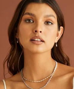 Kendra Scott Juliette Gold Drop Earrings In White Crystal -Earrings Bracelets Elegant Shop Kendra Scott Juliette Drop Earrings Gold 01